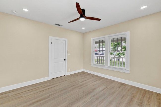 Unfurnished room featuring baseboards, visible vents, a ceiling fan, and light wood-style floors | Image 24