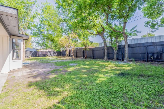 View of yard with a fenced backyard | Image 27
