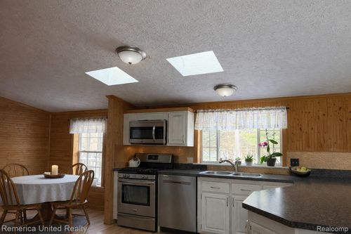 8687 Littlefield Ln, Alanson, MI, 49706-9278 | Card Image