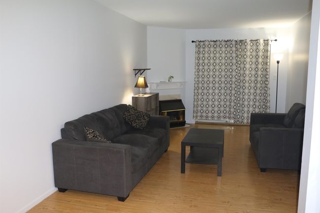 Living room featuring light wood finished floors | Image 8