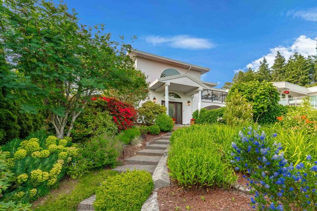 Obstructed view of property with stucco siding and a balcony | Image 35