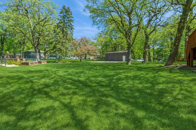 Cute raised garden beds located at the corner of the property! | Image 51