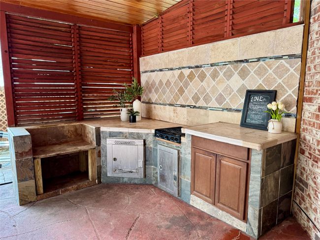 View of patio with exterior kitchen | Image 38