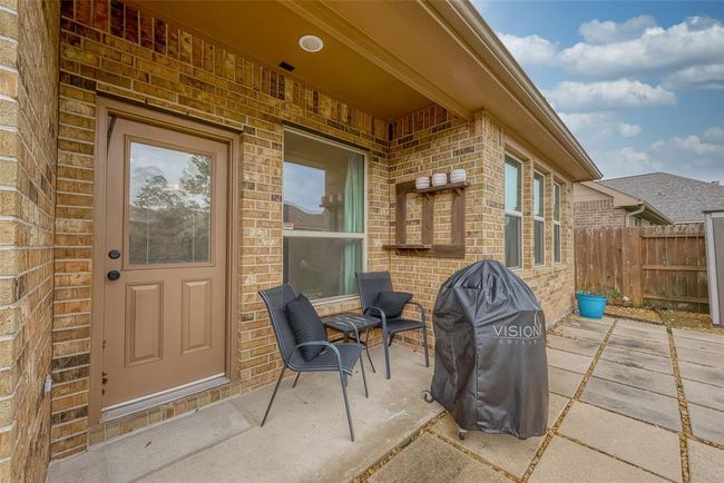 Enjoy your back patio right off the dining room | Image 35