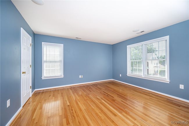 Unfurnished room featuring baseboards and light wood-style flooring | Image 27