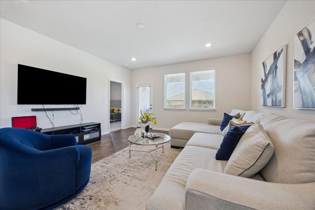 Living area featuring wood finished floors and recessed lighting | Image 15
