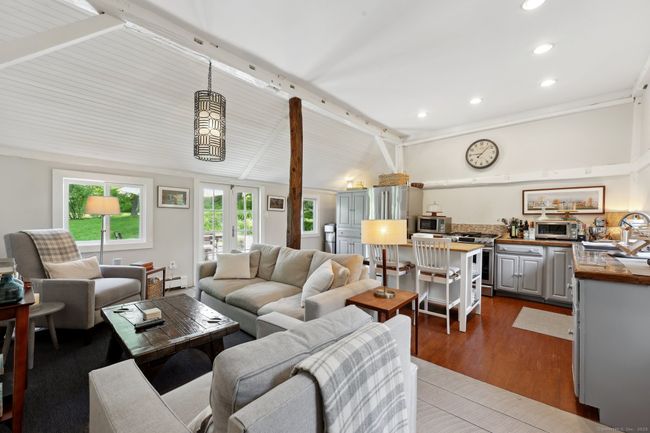 Spacious country kitchen with sitting room area. | Image 8