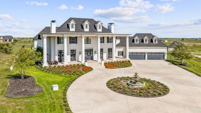 8, 000sf circle drive, 3-tier fountain, massive front porch and 4 car garage | Image 1