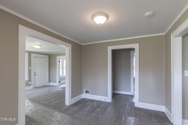 View of Dining Room and looking into the Livingroom (left). | Image 15