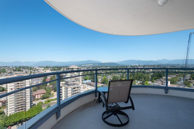 Balcony with a city view and a mountain view | Image 9
