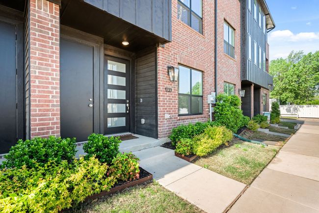 Property entrance with brick siding | Image 5