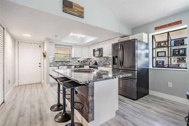 1313 - 1313 Hammock Pine Blvd, Condo with 2 bedrooms, 2 bathrooms and null parking in CLEARWATER FL | Image 6