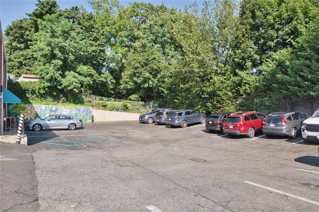 View of uncovered parking lot | Image 11