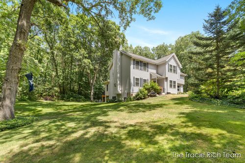 4669 Woodvalley Ct Ne, Rockford, MI, 49341-9790 | Card Image