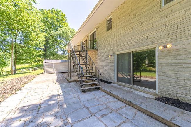 View of patio featuring stairway | Image 27