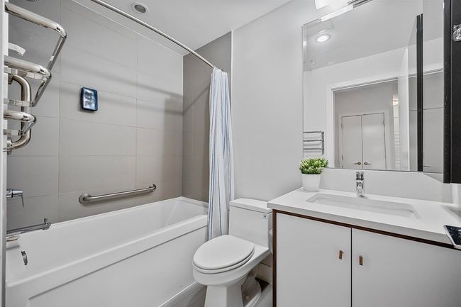 Bathroom with shower / bath combo and vanity | Image 23