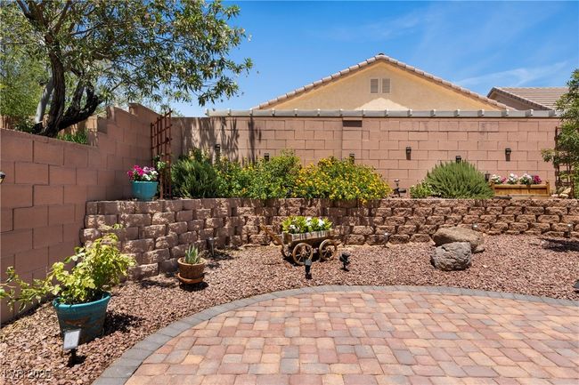Fenced backyard featuring a patio | Image 41
