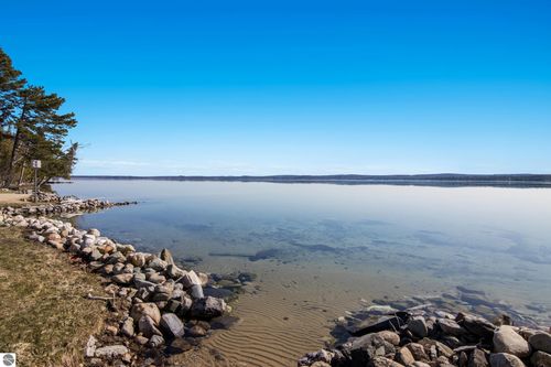 12147 Sw Torch Lake Dr, Rapid City, MI, 49676-9330 | Card Image