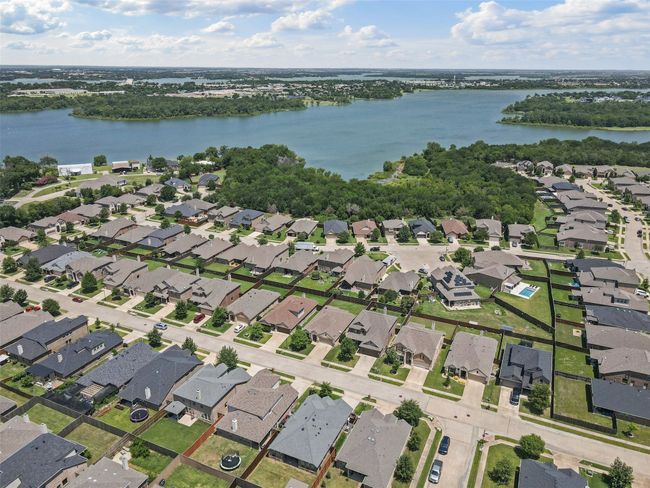 View of Lake from home, easy walk to the water, greenbelts and community pools. | Image 20