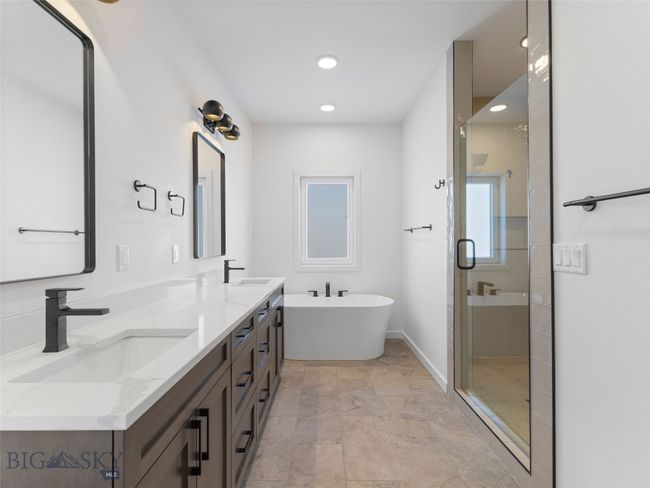 Primary Bathroom with Dual Vanities/Soaker Tub and dual shower head shower | Image 15