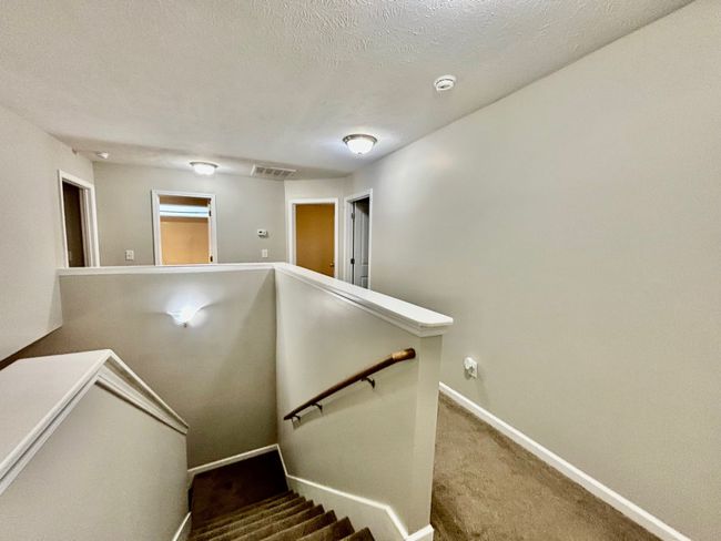 Upstairs has 3 large bedrooms, 2 full baths and Utility Room | Image 8