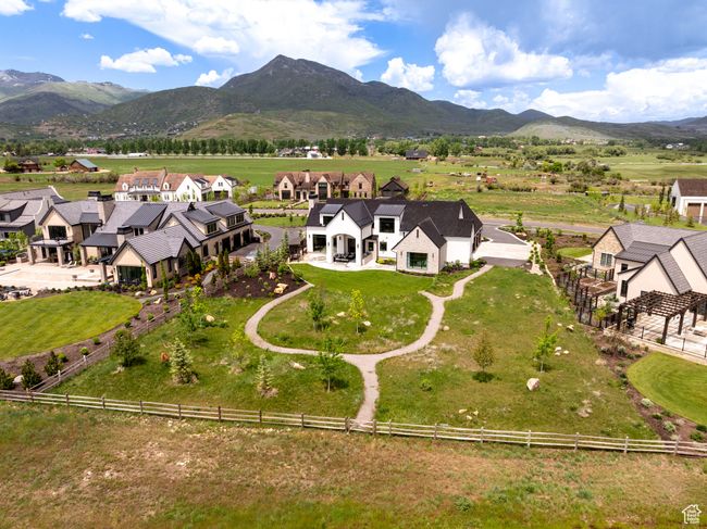 Aerial view of residential area with mountains | Image 59