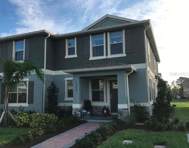 10089 Salt Point Drive, Townhouse with 3 bedrooms, 2 bathrooms and null parking in Winter Garden FL | Image 1