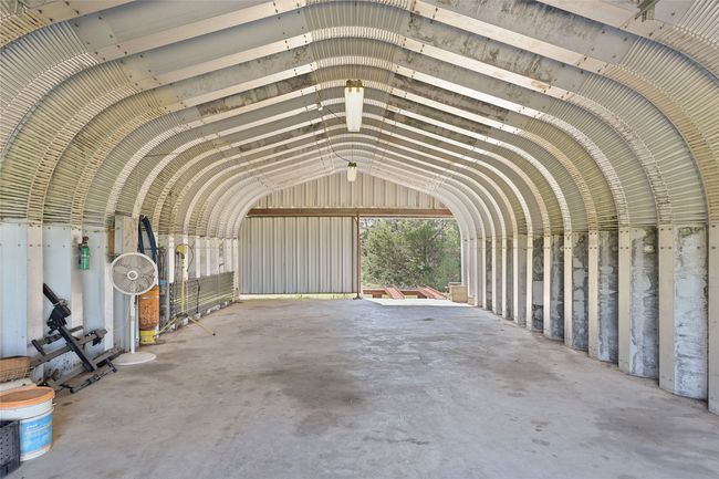 21'X40', 4-car Quonset hut with electricity, compressed air, and a drive-out ramp. Offers ample storage and workspace. | Image 32