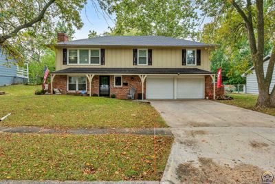 4313 Sw 30th St, House other with 4 bedrooms, 3 bathrooms and null parking in Topeka KS | Image 1