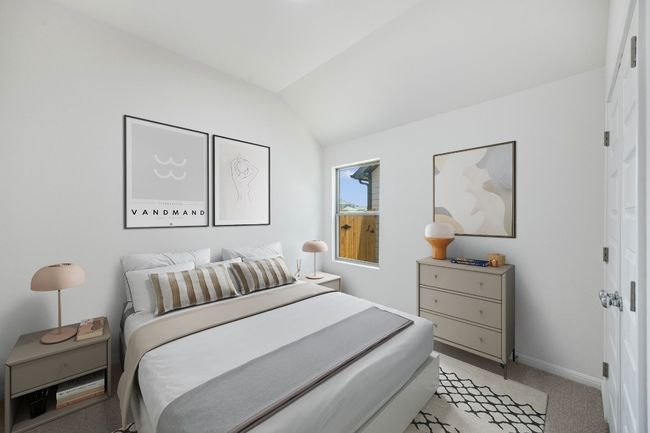 Bedroom featuring lofted ceiling and light colored carpet | Image 26