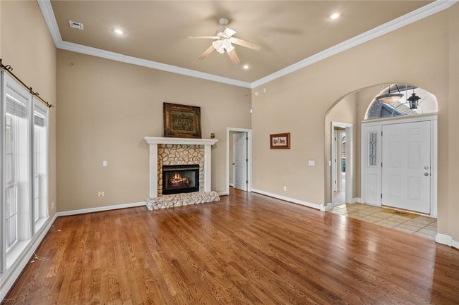 Real red oak hardwoods throughout living room and master | Image 11