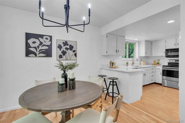 Dining room looking into the kitchen | Image 10