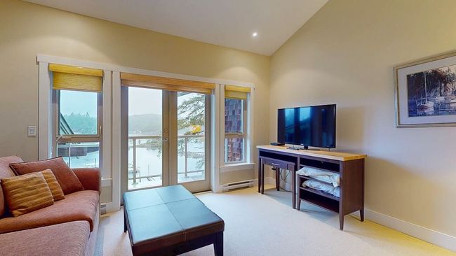 Loft area featuring baseboards, lofted ceiling, light carpet and recessed lighting | Image 33