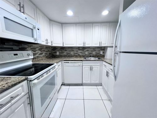 700-420-2580 Nw 56th Ave, Lauderhill, FL, 33313-2415 | Card Image