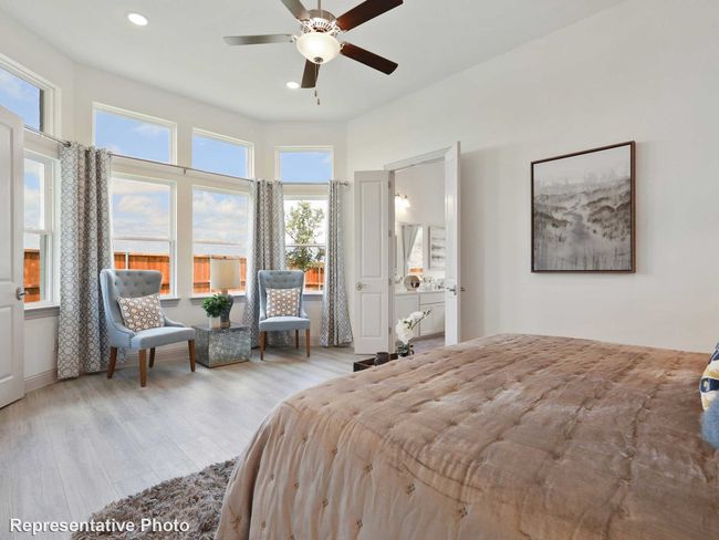 Bedroom with wood finished floors, recessed lighting, and ceiling fan | Image 7
