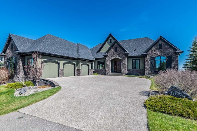 16 Ranche Drive, Home with 4 bedrooms, 3 bathrooms and 6 parking in Heritage Pointe AB | Image 1