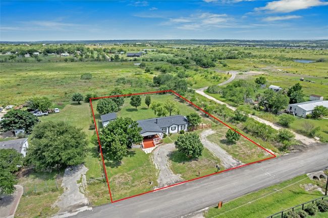 Aerial view of property and surrounding area featuring property parcel outlined | Image 24