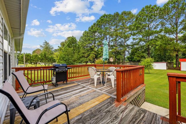 View of outbuilding with view of scattered trees | Image 29