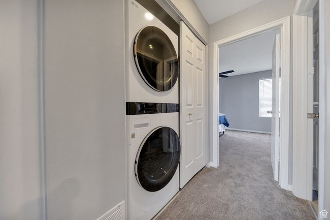 Laundry area with stackable washer and dryer | Image 13