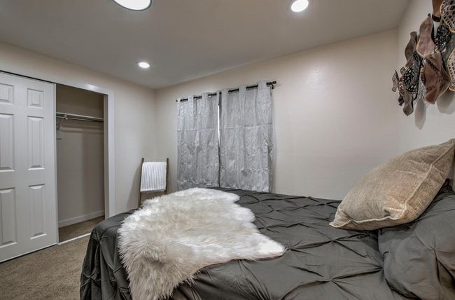 Bedroom with recessed lighting, a closet, carpet, and baseboards | Image 23
