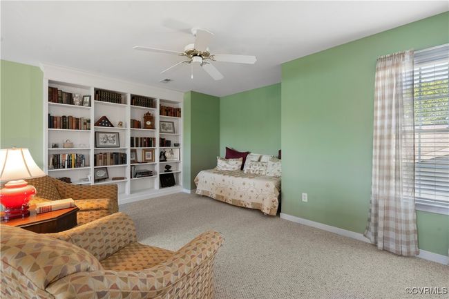 Bedroom featuring carpet and ceiling fan | Image 33