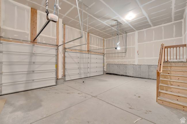 Garage featuring a garage door opener | Image 41