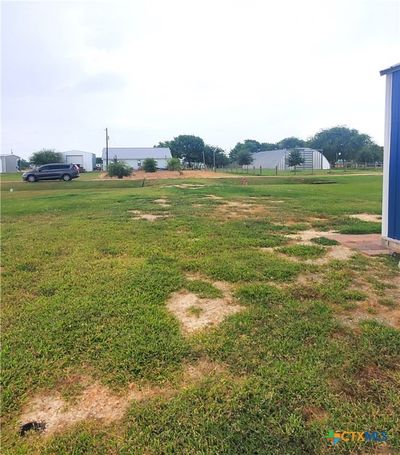 View from rear of lot 17 looking east to Sandhill Lane street access. | Image 3