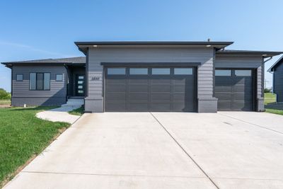 View of front of home featuring a garage | Image 1