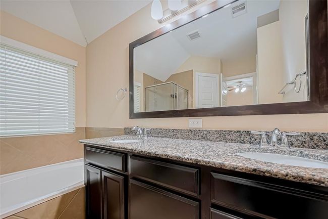 4914 Woodbury Mill Dr, House other with 4 bedrooms, 2 bathrooms and 2 parking in Spring TX | Image 26
