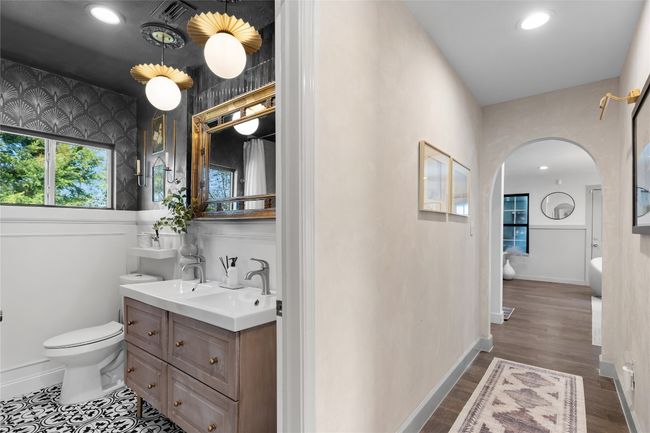Bathroom featuring vanity, wood-type flooring, and toilet | Image 28