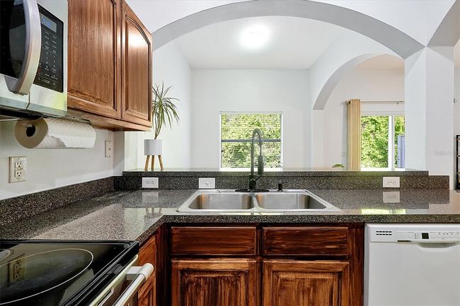 10374 Park Commons Dr, Townhouse with 3 bedrooms, 3 bathrooms and null parking in ORLANDO FL | Image 9