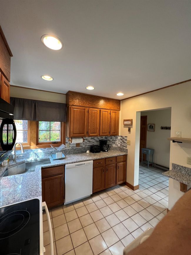 9 Mulligan Ct, Condo with 3 bedrooms, 2 bathrooms and null parking in Laconia NH | Image 6
