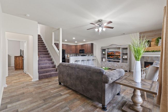 From here, you can see a peak of the primary bedroom settled down the hall and tucked away for privacy. | Image 17