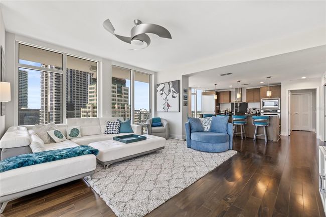 Perfect space for entertaining and views from floor to ceiling windows throughout | Image 14